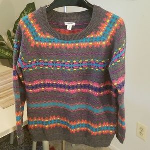 Never worn, stylish and colorful sweater.